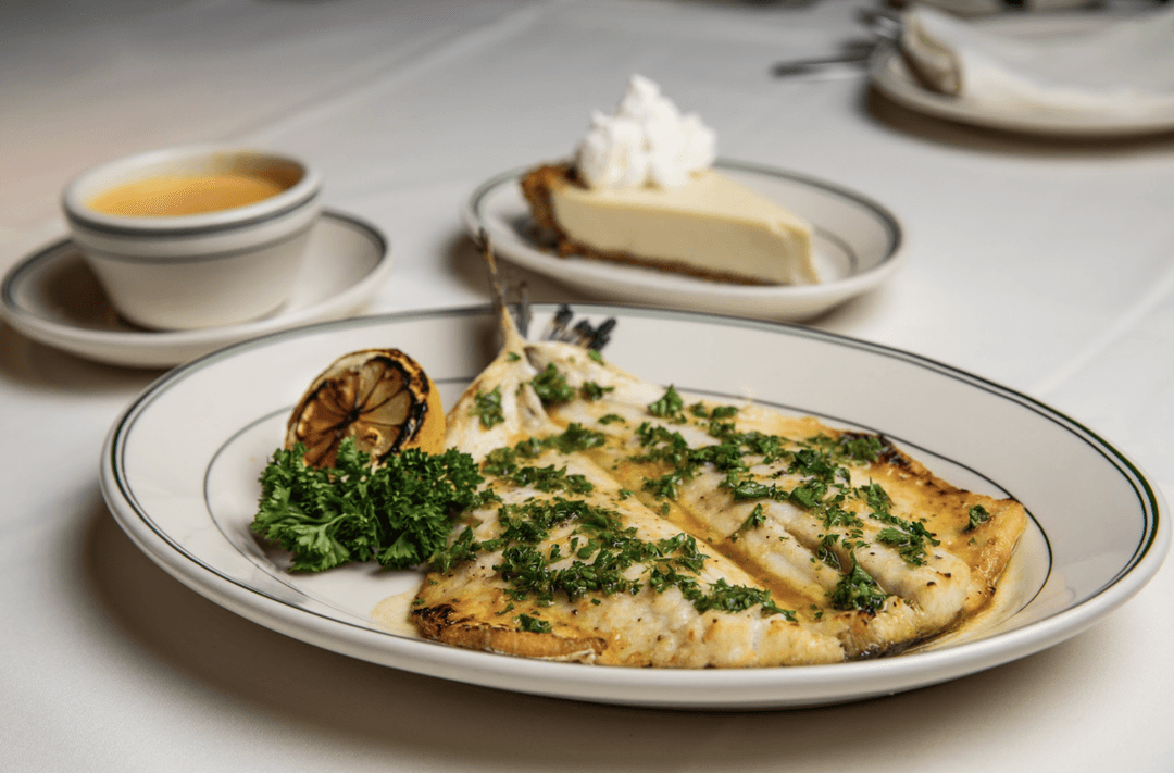 branzino with bisque and key lime pie in the back