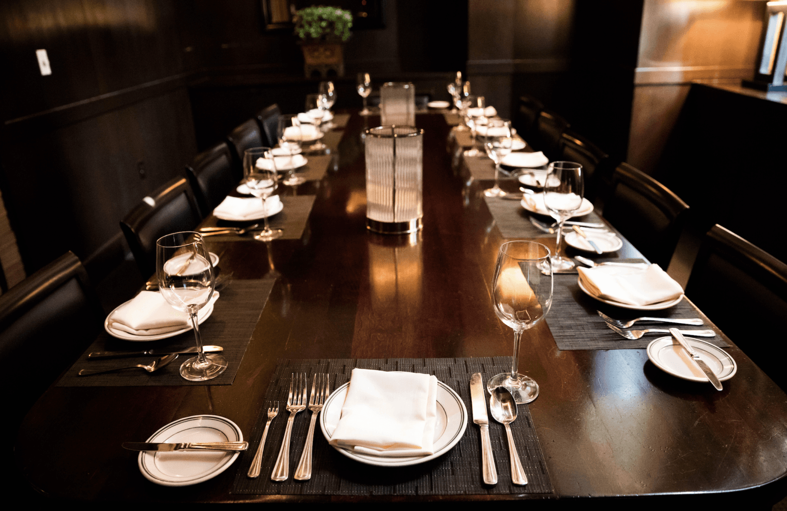 boardroom set up with plateware in joes vegas for a corporate executive meeting